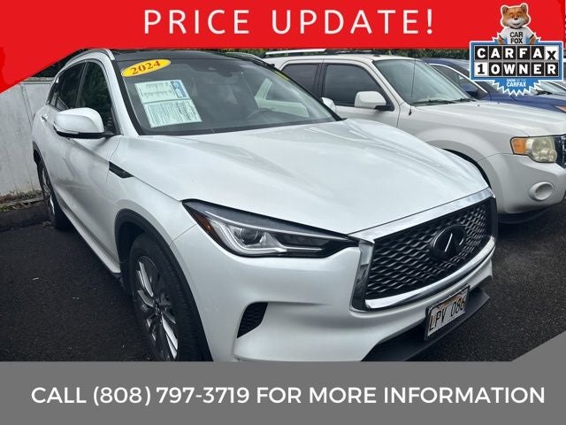 2024 INFINITI QX50 LUXE FWD in Radiant White — front three-quarter view