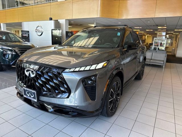 2027 INFINITI QX65 Autograph AWD in Graphite Shadow/Blk Obsid — front three-quarter view