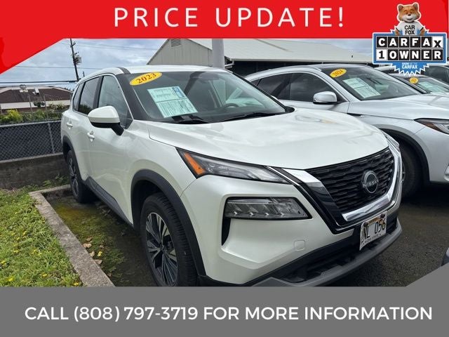 2023 Nissan Rogue SV in Pearl White Tricoat — front three-quarter view