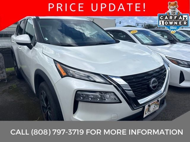 2023 Nissan Rogue SV in Pearl White Tricoat — front three-quarter view