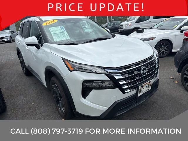 2024 Nissan Rogue SV in Everest White Pearl — front three-quarter view
