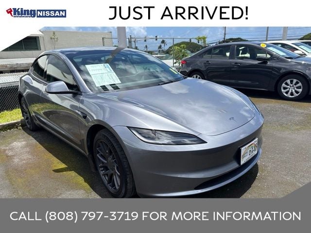 2025 Tesla Model 3 Long Range in Stealth Gray — front three-quarter view