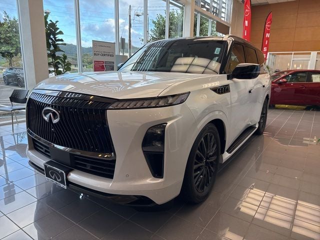2025 INFINITI QX80 Autograph 4WD in Radiant White/Black Obsidian — front three-quarter view